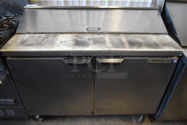 Beverage Air SPE48-12 Stainless Steel Commercial Sandwich Salad Prep Table Bain Marie Mega Top on Commercial Casters. 115 Volts, 1 Phase. 48x30x42. Tested and Powers On But Temps at 52 Degrees