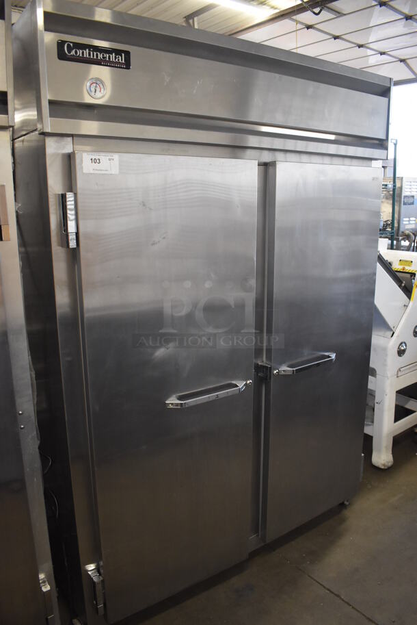 Continental 2RE-SS Stainless Steel Commercial 2 Door Reach In Cooler on Commercial Casters. 115 Volts, 1 Phase. 58x34x81. Tested and Powers On But Temps at 43 Degrees - Image 1 of 6