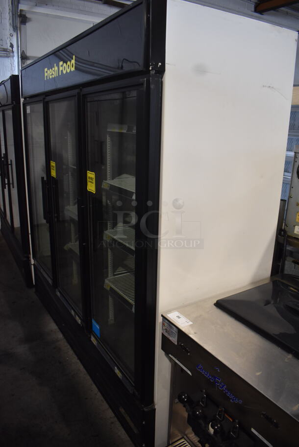 True GDM-72 Commercial Reach In Floor Style Triple Swing Glass Door Merchandiser Cooler In Black With Polycoated Racks. 115V/ 1 Phase Tested And Working - Image 3 of 7