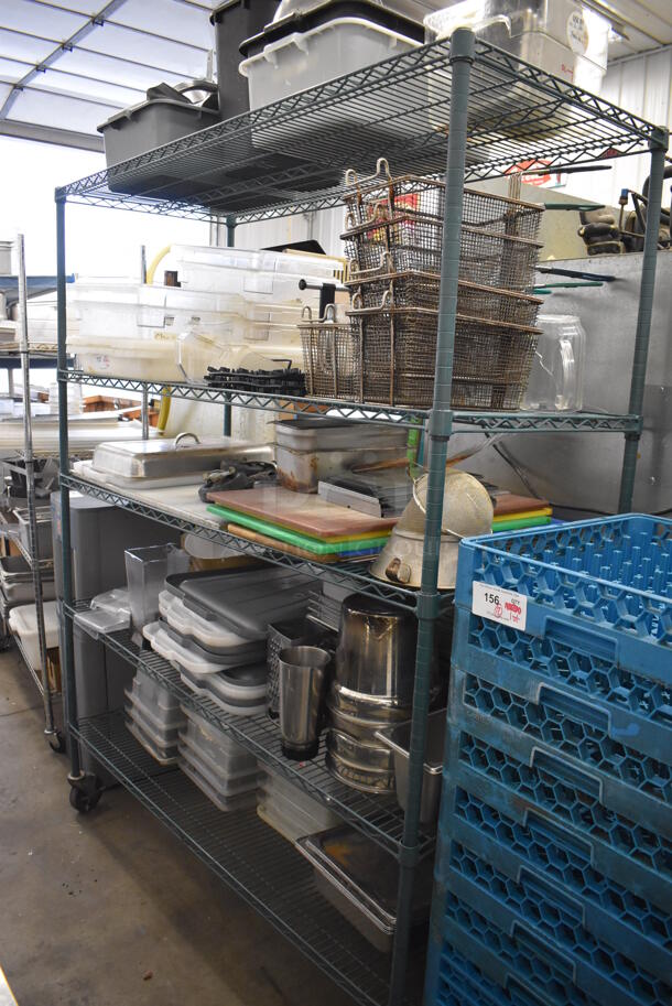 ALL ONE MONEY! Lot of 4 Tiers Worth of Various Items Including Poly Bus Bins, Metal Fry Baskets, Cutting Boards and Poly Bins. Does NOT Include Shelving Unit