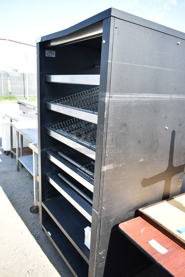 Vulcan 1013776 Metal Commercial Bakery Bagel Donut Merchandiser Rack on Commercial Casters.  - Image 1 of 6