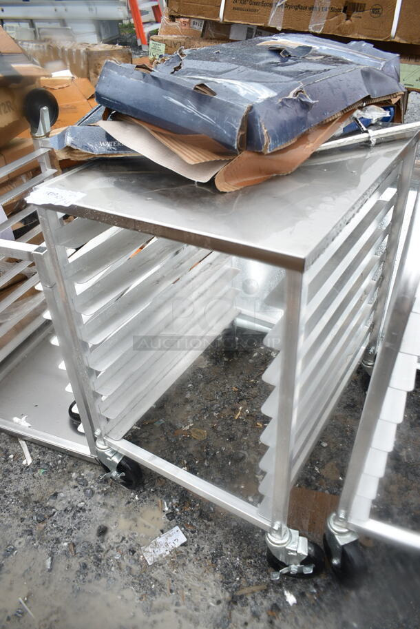 BRAND NEW SCRATCH AND DENT! Regency 600UPR8WTELS 8 Pan End Load Aluminum Undercounter Bun / Sheet Pan Rack with Stainless Steel Top and Side Channel - Image 3 of 7
