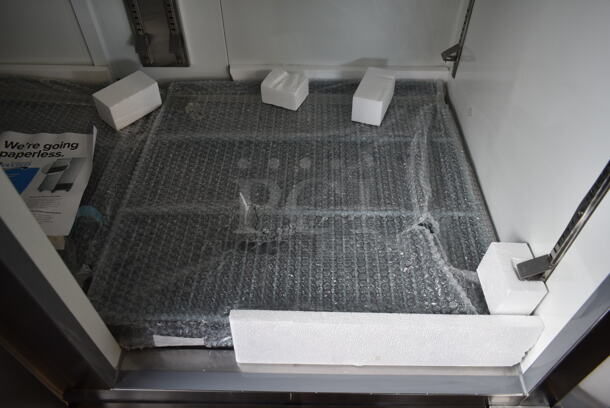 BRAND NEW SCRATCH AND DENT! 2022 Avantco 178A49RHC Stainless Steel Commercial 2 Door Reach In Cooler w/ Poly Coated Racks on Commercial Casters. 115 Volts, 1 Phase. Tested and Working! - Image 8 of 10