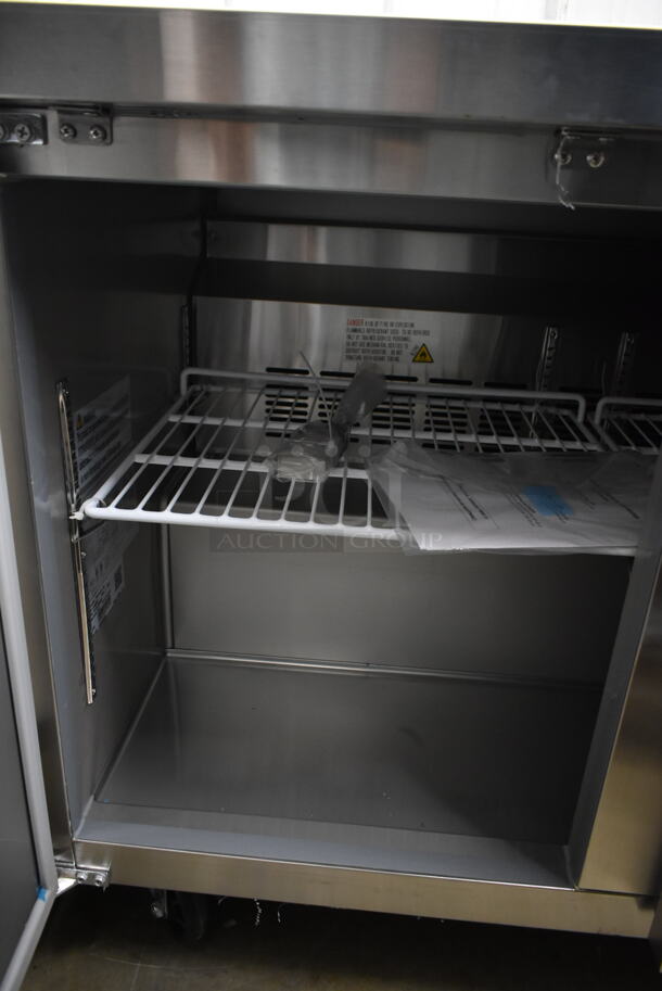 BRAND NEW SCRATCH AND DENT! 2023 KoolMore FWT-2D-12C Stainless Steel Commercial 2 Door Work Top Freezer on Commercial Casters. 115 Volts, 1 Phase. Tested and Working! - Image 5 of 7