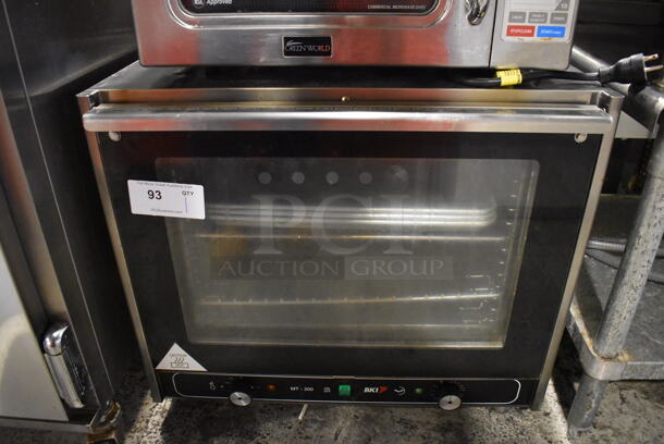 BKI MT200 Stainless Steel Commercial Countertop Convection Oven w/ View Through Doors and Metal Oven Racks. 27x23x24.5