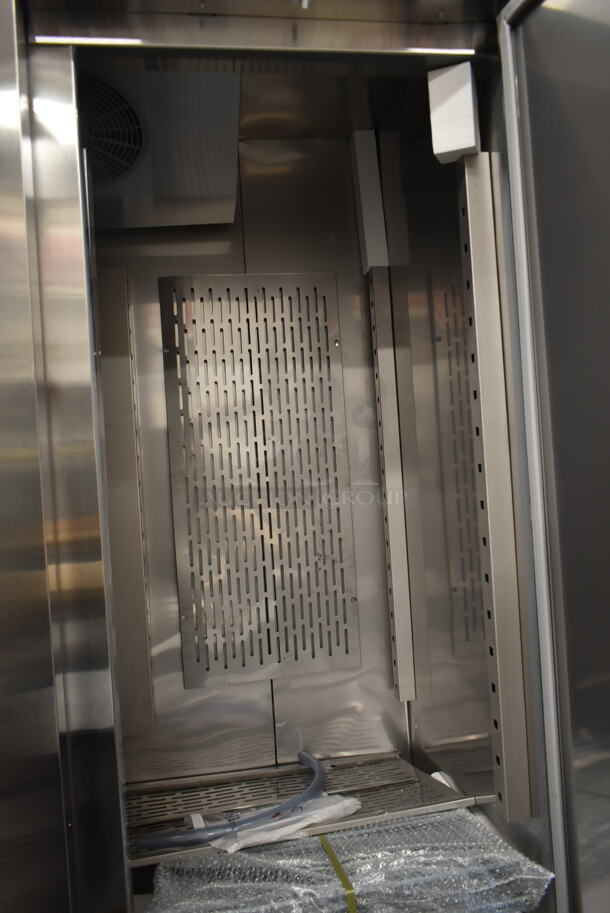 BRAND NEW SCRATCH AND DENT! 2023 Avantco 178SS3FHC Stainless Steel Commercial 3 Door Reach In Freezer w/ Poly Coated Racks on Commercial Casters. 115 Volts, 1 Phase. Tested and Working! - Image 11 of 11