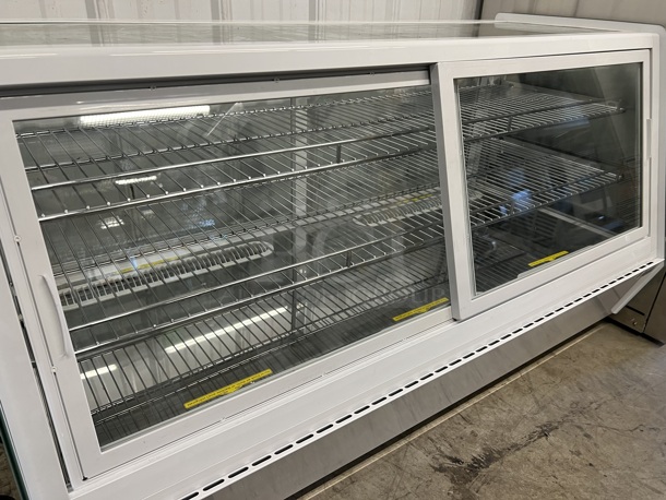 BRAND NEW SCRATCH AND DENT! Avantco 360BCSS48HCW Metal Commercial Floor Style Refrigerated Display Case Merchandiser. 115 Volts, 1 Phase. 48x23x27. Tested and Working! - Image 6 of 11