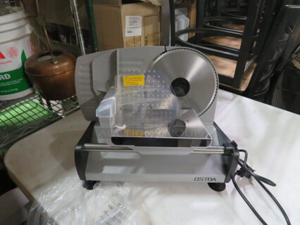 One Ostba Deli Slicer. #SL518. 120 Volt.