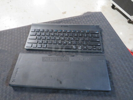One Logitech Keyboard And Case For IPAD.