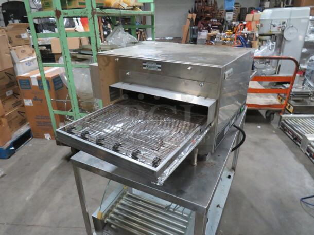 One CTI Lincoln Impinger Conveyor Pizza Oven On A Stainless Steel Table With SS Under Shelf On Casters. Model# 2502HB3U0701620. 240 Volt 1 Phase. Oven 50X32X18. Table 42X26X29. - Image 7 of 7