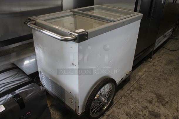 Metal Commercial Mobile Ice Cream Chest Freezer Merchandiser on Casters. Tested and Powers On But Does Not Get Cold - Image 1 of 6