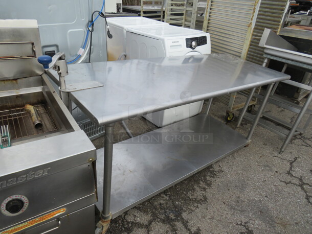 One Stainless Steel Table With Under Shelf With An Edlund 10lb Can Opener. 72X30X44 - Image 1 of 3