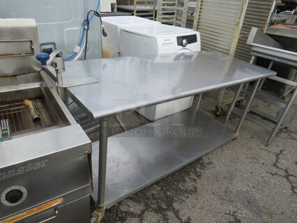 One Stainless Steel Table With Under Shelf With An Edlund 10lb Can Opener. 72X30X44
