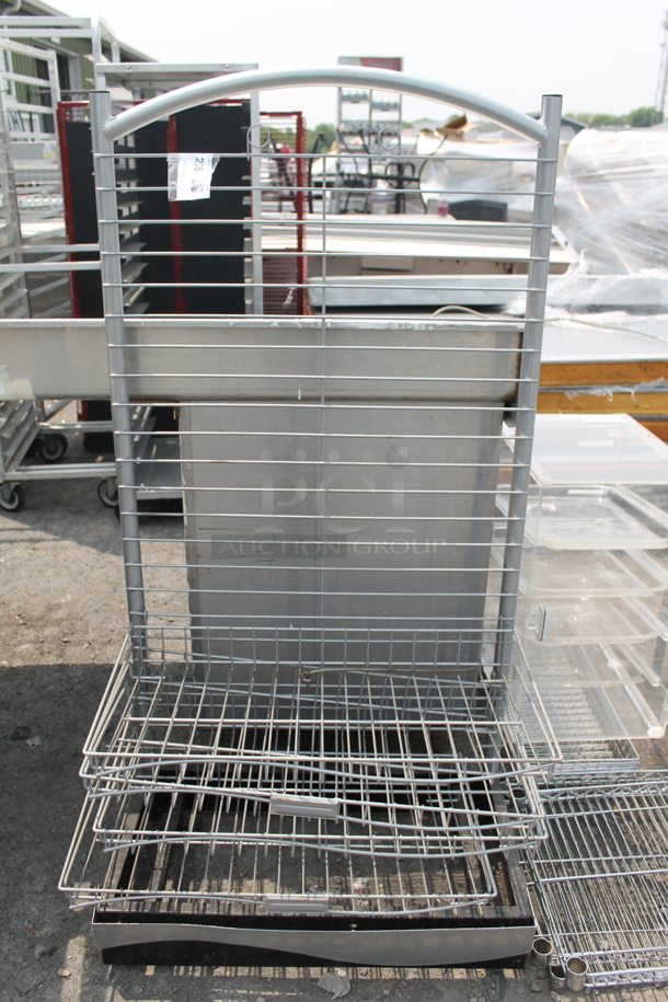 Disassembled Steel Shelving Unit On Commercial Casters.