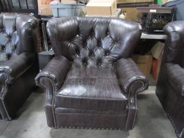 One AWESOME Brown Leather Look Over Stuff Chair. VERY COMFY