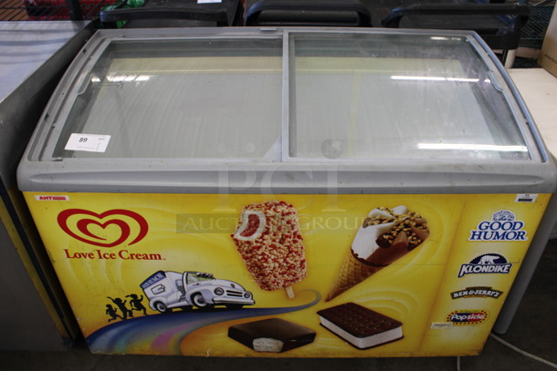 AHT Model RIO S 125 Metal Commercial Novelty Ice Cream Chest Freezer Merchandiser on Commercial Casters. 120 Volts, 1 Phase. 49x26x35. Tested and Does Not Power On
