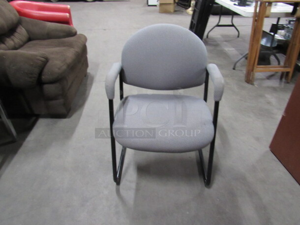Metal Framed Office Arm Chair With Gray Cushioned Seat And Back. 3XBID