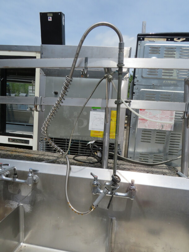 One Stainless Steel 3 Compartment Sink With 2 Faucets, Hose Sprayer, R/L Drain Board, R/L And Back Splash, And Over Head Dual Pot Rack. Sink 24X26X11. 131X30X44. - Image 2 of 3