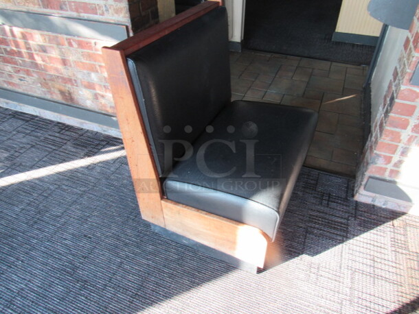 One Single Sided Wooden Booth With A Black Cushioned Seat And Back. 59X25X36