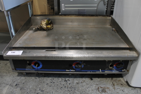Star Max Stainless Steel Commercial Countertop Natural Gas Powered Flat Top Griddle. 