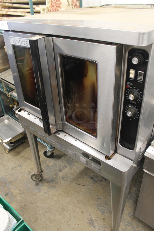 Blodgett DFG-100-3 Stainless Steel Commercial Propane Gas Powered Full Size Convection Oven w/ View Through Doors, Metal Oven Racks, Thermostatic Controls, and Metal Legs on Commercial Casters.