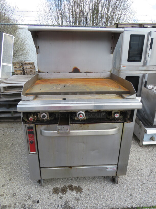 One Blodgett Natural Gas Griddle Range With Stainless Steel Over Shelf. Model# B36A-TTT. 36X38X60