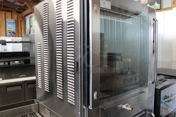 BRAND NEW! BKI VGG-16F Stainless Steel Commercial Electric Powered Rotisserie Oven on Commercial Casters. Stock Picture Used as Gallery Picture. 208 Volts, 3 Phase. Goes GREAT w/ Lot #4! - Image 10 of 11