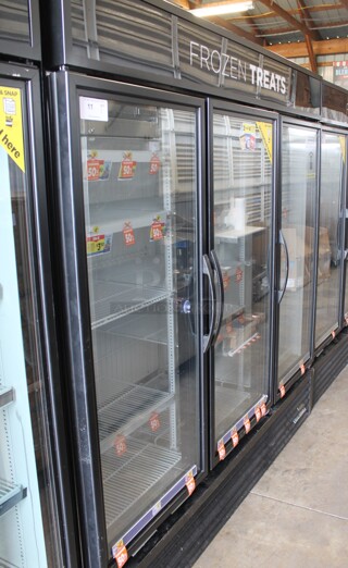 2016 True GDM-72F-HC-TSL01 Metal Commercial 3 Door Reach In Freezer Merchandiser w/ Poly Coated Racks. 115/208-230 Volts, 1 Phase.