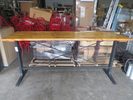 One Wooden Table Top On A Bar Height Black Industrial Base. 96X27.5X42