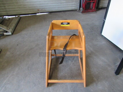 One Wooden High Chair.