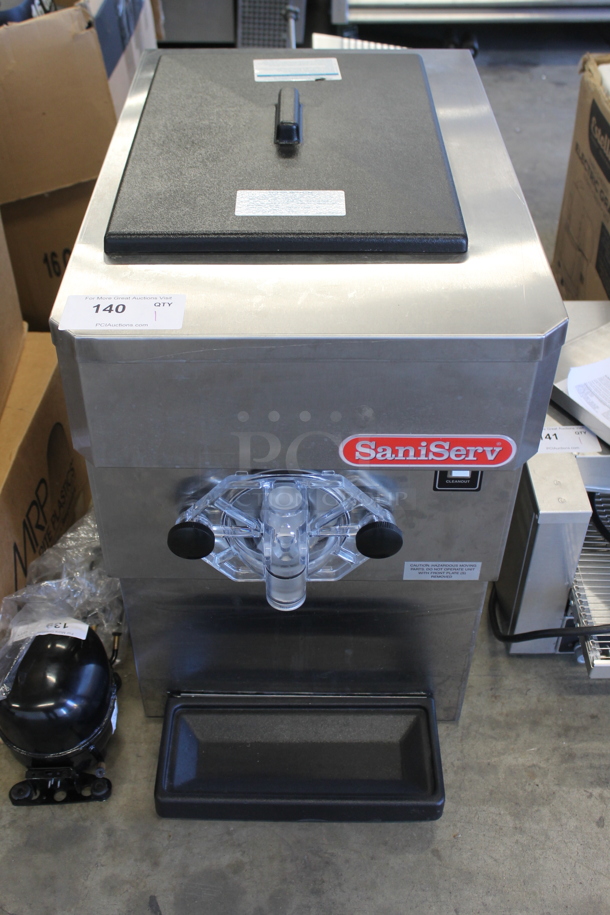 BRAND NEW SCRATCH AND DENT! 2023 SaniServ A7091H Stainless Steel Commercial Countertop Air Cooled Single Flavor Frozen Beverage Machine. 208-230 Volts, 1 Phase.  - Image 1 of 6