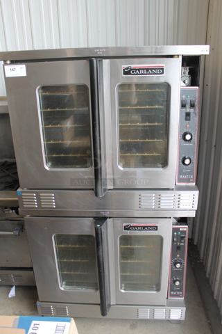 2 Garland Master 200 Stainless Steel Commercial Natural Gas Powered Full Size Convection Ovens w View Through Doors, Metal Oven Racks and Thermostatic Controls. 2 Times Your Bid!
