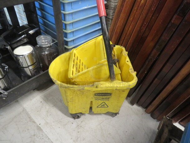 One Rubbermaid Mop Bucket And Wringer. - Image 1 of 1