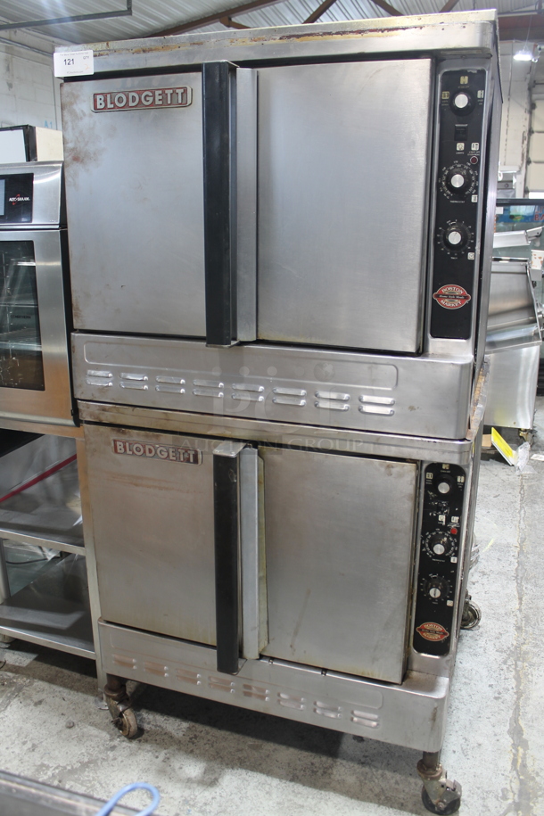 2 Blodgett Stainless Steel Commercial Natural Gas Powered Full Size Convection Oven w/ Solid Doors, Metal Oven Racks and Thermostatic Controls on Commercial Casters. 2 Times Your Bid!