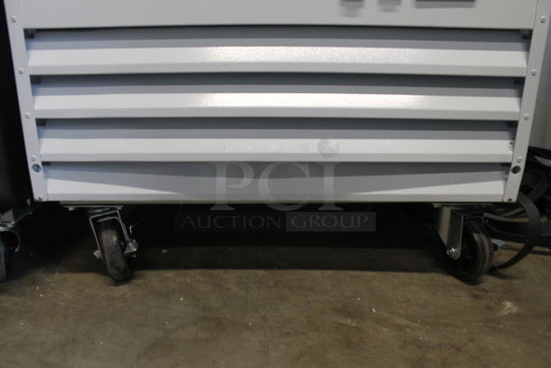 BRAND NEW SCRATCH AND DENT! 2023 Avantco 178GDC12FHCW Metal Commercial Single Door Reach In Freezer Merchandiser w/ Poly Coated Racks on Commercial Casters. See Pictures For Broken Glass and Bottom Dent. 115 Volts, 1 Phase. Tested and Working! - Image 3 of 6