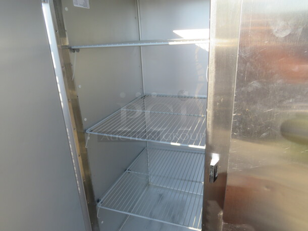 ONE AWESOME WORKING 3 Door Traulsen Refrigerator With 9 Racks On Casters. Model# G30011. 115 Volt. 76.5X34X83.5. $9175.68 - Image 3 of 3