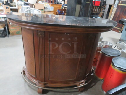 One Wooden Half Circle Bar With 2 Doors, 2 Drawers, 3 Wine Holder Racks, Footrail, And Black Granite Top. NICE!!! 69.5X28X52