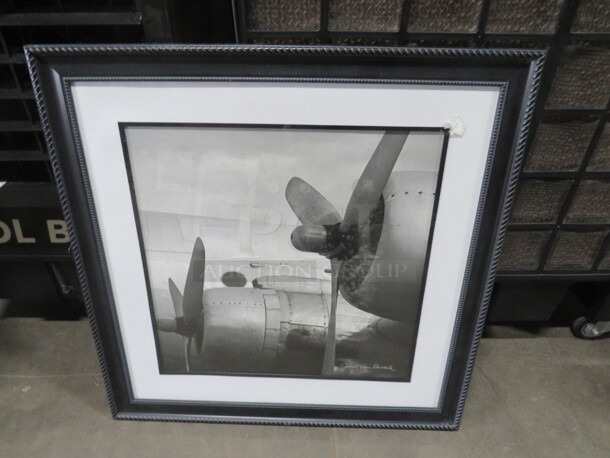 One 34X34 Framed/Matted Picture.