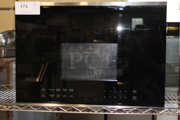 2020 Xo XOOTR24BS Metal Countertop Over The Range Microwave Oven. 120 Volts, 1 Phase. 