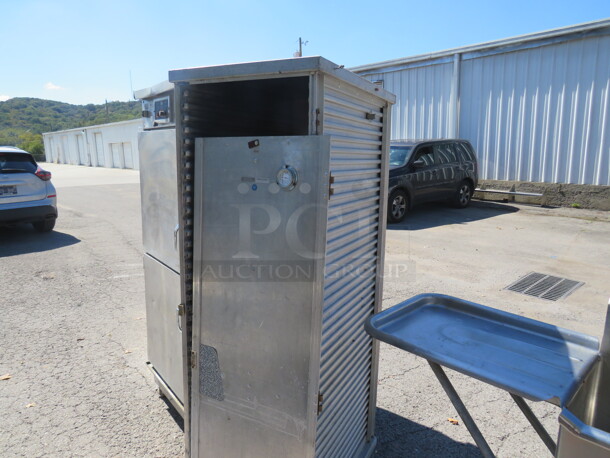 One Crescor Holding Cabinet On Casters. 21X31X70 - Image 1 of 3