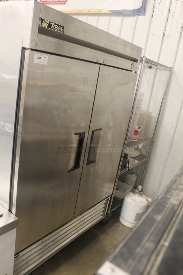 True T-49F Commercial Stainless Steel 2 Solid Door Reach-In Freezer. 115 V, 1 Phase. Tested and Powers On But Does Not Get Cold