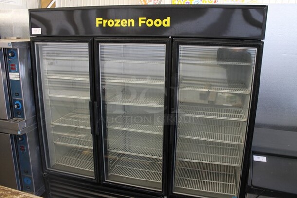 2015 True GDM-72F-LD ENERGY STAR Metal Commercial 3 Door Reach In Freezer Merchandiser w/ Poly Coated Racks. 115/208-240 Volts, 1 Phase.