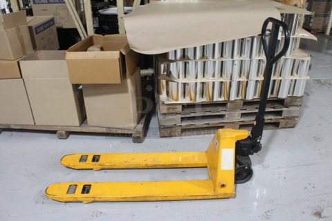 Uline H-1193 Metal Yellow Narrow Fork Pallet Jack Pallet Truck. 