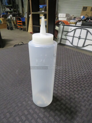 One Lot Of 14 Squeeze Bottles.