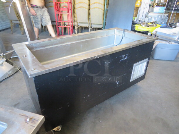 One Refrigerated Cold Table WIth Drain On Casters. 60X28X30
