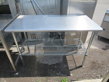 One Stainless Steel Table With Metro Under Shelf. 49.5X24X34.5