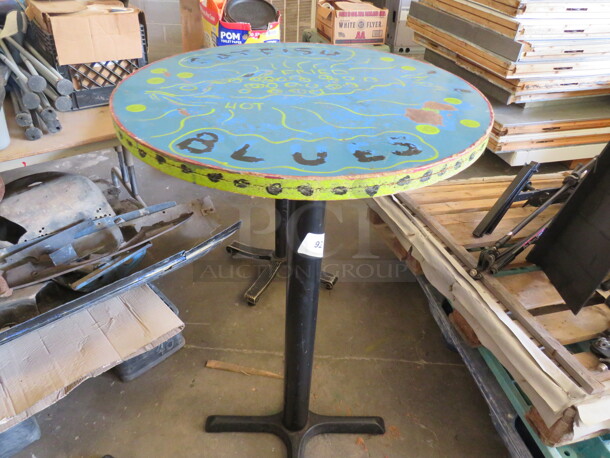 One 24X24X42 Hand Painted Bar Height Table On A Pedestal Base. 