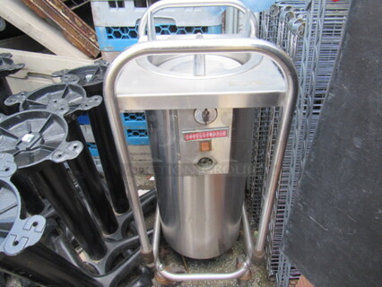 One Stainless Steel Plate Carrier On Casters.