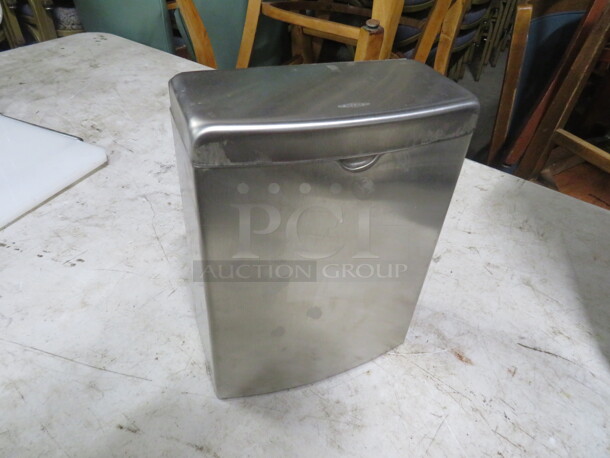One Stainless Steel Waste Receptacle.