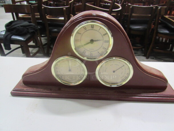 One Wooden Clock/Thermometer/Hygrometer.